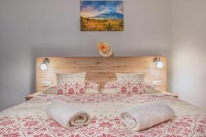 Postel nebo postele na pokoji v ubytování Penzión Ciriak