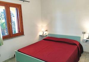 Ένα ή περισσότερα κρεβάτια σε δωμάτιο στο Le Maree Geranium