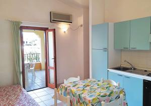 Η κουζίνα ή μικρή κουζίνα στο Le Maree Geranium