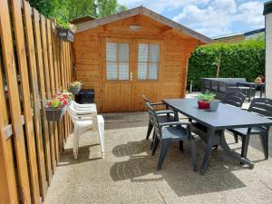 Patio nebo venkovní prostory v ubytování Comfortabel en gezellig familie chalet tot 6 personen op de Veluwe Bungalowpark De Kern - All inclusive