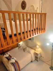 Posteľ alebo postele v izbe v ubytovaní Casetta Rubichi Apartment
