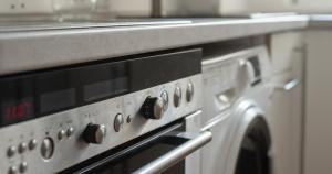 a close up of a stove top oven at Cozy and fully equiped suite apartment at Ku'damm (80 m2) in Berlin