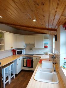 מטבח או מטבחון ב-Rhubarb Cottage - A cosy country retreat