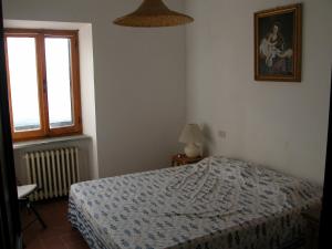 Postel nebo postele na pokoji v ubytování Castello di Mongiovino + 30 fotografií