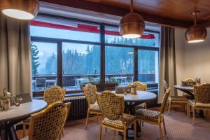 Posezení v ubytování Wellness Hotel Šedý Vlk