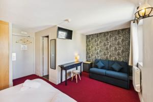 Voodi või voodid majutusasutuse HOTEL TURAN toas