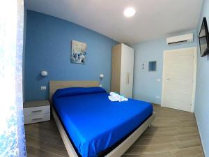 Postel nebo postele na pokoji v ubytování B&B Il Gioiello