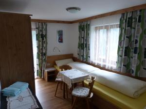 Rúm í herbergi á Haus Wechner