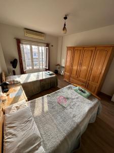 A bed or beds in a room at Deluxe room in Degla,Maadi