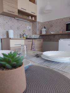 Кухня або міні-кухня у Scala Studio Apartments
