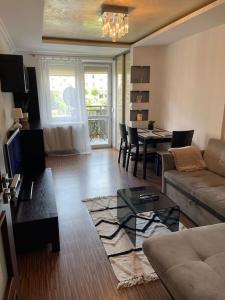 Posezení v ubytování Urokliwy Apartament w Nowym Sączu