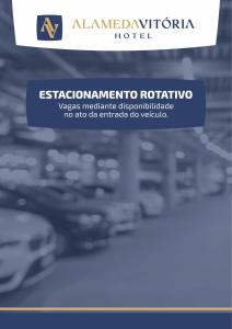 Un cartello che dice "Hotel Ambasciatore con auto sullo sfondo" di Alameda Vitória Hotel a Vitória