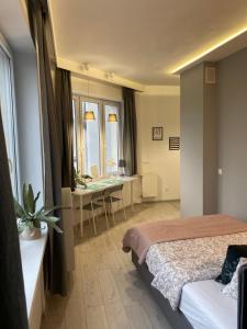 Posteľ alebo postele v izbe v ubytovaní Exclusive Apartments Smolna