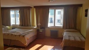 Postel nebo postele na pokoji v ubytování Monte Cervino Hotel