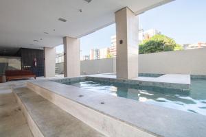 Bazén v ubytování Acqua Prime Maceió Ponta Verde nebo v jeho okolí