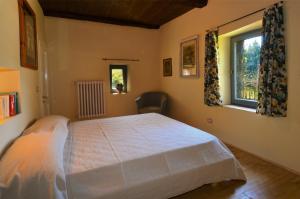 Postel nebo postele na pokoji v ubytování La Cannara + 29 fotografií