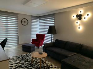 Posedenie v ubytovaní Apartamenty Leśna 1