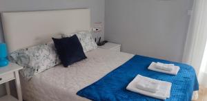 Łóżko lub łóżka w pokoju w obiekcie Bungalow Deluxe Gran Alacant