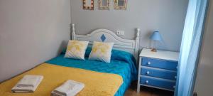 Łóżko lub łóżka w pokoju w obiekcie Bungalow Deluxe Gran Alacant