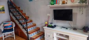 Telewizja i/lub zestaw kina domowego w obiekcie Bungalow Deluxe Gran Alacant