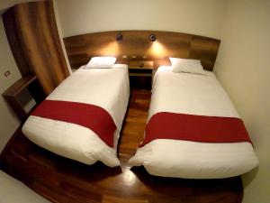 Postel nebo postele na pokoji v ubytování Zans Apartments Cusco