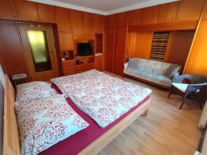 Säng eller sängar i ett rum på Modernes Apartment in Wien