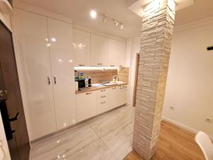 Kuchyňa alebo kuchynka v ubytovaní Zagreb4you Apartments