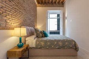 Posteľ alebo postele v izbe v ubytovaní Wonderful apartment with three bedrooms and two bathrooms in the center