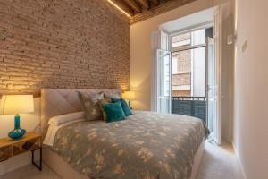 Posteľ alebo postele v izbe v ubytovaní Wonderful apartment with three bedrooms and two bathrooms in the center