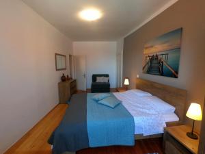 Postel nebo postele na pokoji v ubytování APARTMENT DINKA