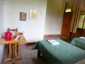 Postel nebo postele na pokoji v ubytování Wandari Lodge
