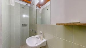 Ένα μπάνιο στο Casa Los Naranjos Hostal