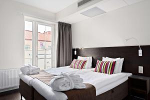 Postel nebo postele na pokoji v ubytování Best Western Plus Hotell Nordic Lund