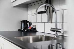 Kuchyň nebo kuchyňský kout v ubytování Best Western Plus Hotell Nordic Lund