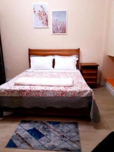 Un pat sau paturi într-o cameră la Recanto Vovô João