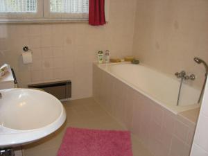 a bathroom with a bath tub and a sink at Prince d'Orange Bed & Breakfast in Braine-lʼAlleud +27 photos