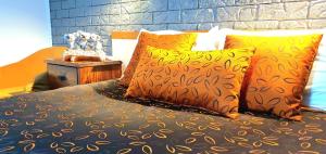 Ένα ή περισσότερα κρεβάτια σε δωμάτιο στο Goldrush Motel Young CBD +45 φωτογραφίες