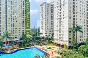 an aerial view of a city with tall buildings at RedLiving Apartemen Kalibata City - Homy Jasen Tower Jasmine in Jakarta