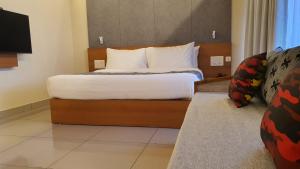 Katil atau katil-katil dalam bilik di Upavan Resort