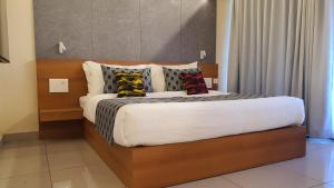 Katil atau katil-katil dalam bilik di Upavan Resort