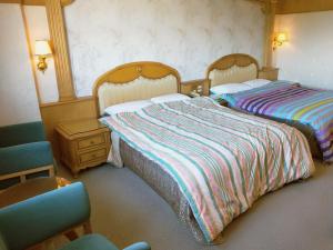 Katil atau katil-katil dalam bilik di New Daxi B&B