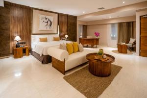 Postel nebo postele na pokoji v ubytování Crystalkuta Hotel - Bali