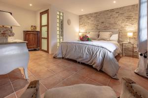 Postel nebo postele na pokoji v ubytování Bastide Aïna SPA et piscine