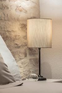 Postel nebo postele na pokoji v ubytování Bastide Aïna SPA et piscine