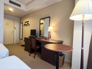 TV a/nebo společenská místnost v ubytování Tottori Onsen Hotel Monarque Tottori