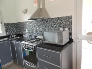 Kjøkken eller kjøkkenkrok på La Ribera Home & Rest Mendoza