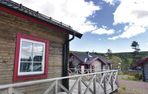 a house with a red window on the side of it at 3 Bedroom Beautiful Home In Slen in Sälen