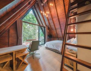 Postel nebo postele na pokoji v ubytování Kenaray Farmstay riverside