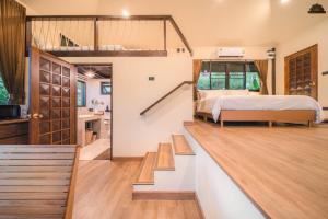 Postel nebo postele na pokoji v ubytování Kenaray Farmstay riverside