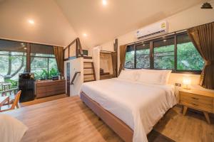 Postel nebo postele na pokoji v ubytování Kenaray Farmstay riverside
